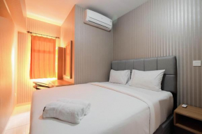 Relaxing 2BR Apartment at The Springlake Summarecon By Travelio